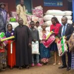  Centenary Bank-Kasese  donates relief items to IDPs at Bwitho Primary school